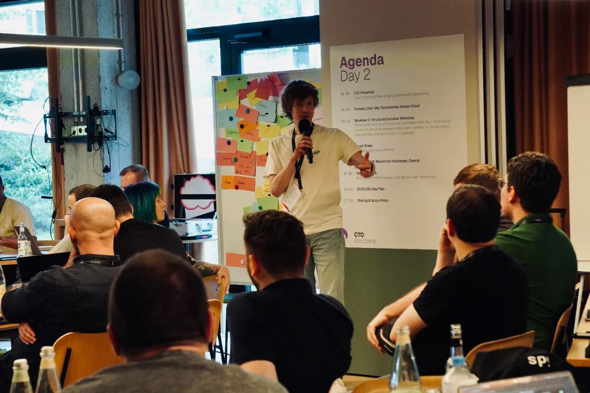A speaker addressing members at a bootcamp